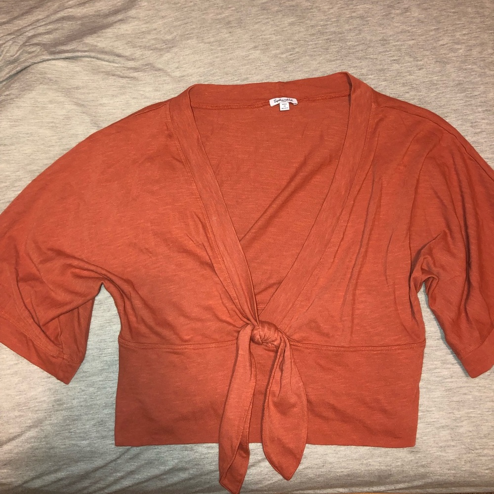 burnt orange deep V neck going out shirt